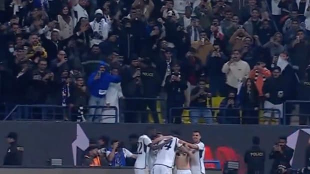 Real Madrid's players pictured celebrating after beating Atletico Madrid 5-3 in the semi-finals of the 2023/24 Supercopa de Espana